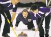 PHIL.HOSSACK@FREEPRESS.MB.CA
Nova Scotia skip Paul Flemming barks instructions to sweepers Glen MacLeod and Kelly MacIntosh during Wednesday night’s game versus Manitoba.
