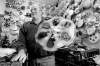 JOE.BRYKSA@FREEPRESS.MB.CA 
Baldur Holm, known as the Hubcap Man for the last 25 years in Winnipeg, holds a rotating Cadillac hubcap.