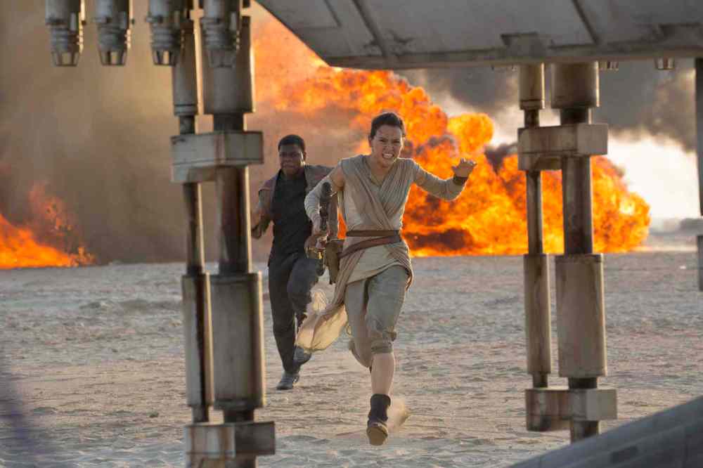 David James / Disney
From left: Finn (John Boyega) and Rey (Daisy Ridley) in 'Star Wars: The Force Awakens.'