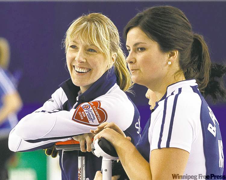 FRANK GUNN / THE CANADIAN PRESS
Nova Scotia skip Heather Smith-Dacey (left) and second Blisse Comstock will face relative rookie Rachel Homan’s Ontario squad today in the 3-4 Page playoff match.