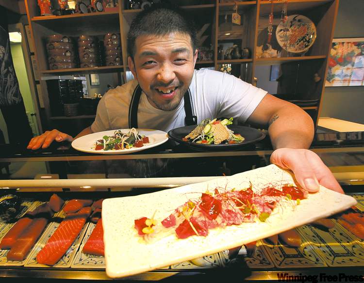 PHIL.HOSSACK@FREEPRESS.MB.CA
Makoto Ono offers up a beautifully prepared tray of Bison Tataki at the incomparable Edohei.