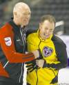 DAVE CHIDLEY / THE CANADIAN PRESS
Ontario skip Glenn Howard and his nephew, New Brunswick second Steven Howard, joke around after practice Friday for the Tim Horton's Brier Canadian Curling Championship in London, Ont. Brier competition begins today and concludes with the final on March 13. Steven Howard is TSN  analyst Russ Howard's son.