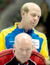 NATHAN DENETTE / THE CANADIAN PRESS
The Old Bear, Alberta skip Kevin Martin, peers over the shoulder of Ontario skip Glenn Howard Thursday night.