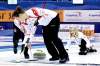 NIELS HUSTED / THE ASSOCIATED PRESS
Team Canada skip Amber Holland instructs sweepers Heather Kalenchuk and Tammy Schneider in the final against Sweden at the world championship.
