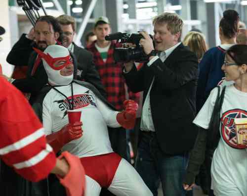 eOne Films
Mike Smith, right, films Swearman (Patrick Roach), the expletive-spewing mascot of the SwearNet.com website.