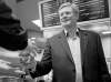Adrian Wyld / THE CANADIAN PRESS
Prime Minister Stephen Harper hands out the brew at a Tim Hortons during a campaign stop in Dieppe, N.B. Friday.