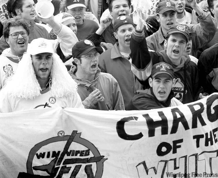 KEN GIGLIOTTI / WINNIPEG FREE PRESS archives
Dancing Gabe (back left) and devoted fans show their love at a Save the Jets Rally held at Portage and Main in 1995.
