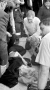 PHIL.HOSSACK@FREEPRESS.MB.CA
Michael Ignatieff leans down to comfort a woman who fell and struck her head during a rally in Winnipeg on Tuesday.
