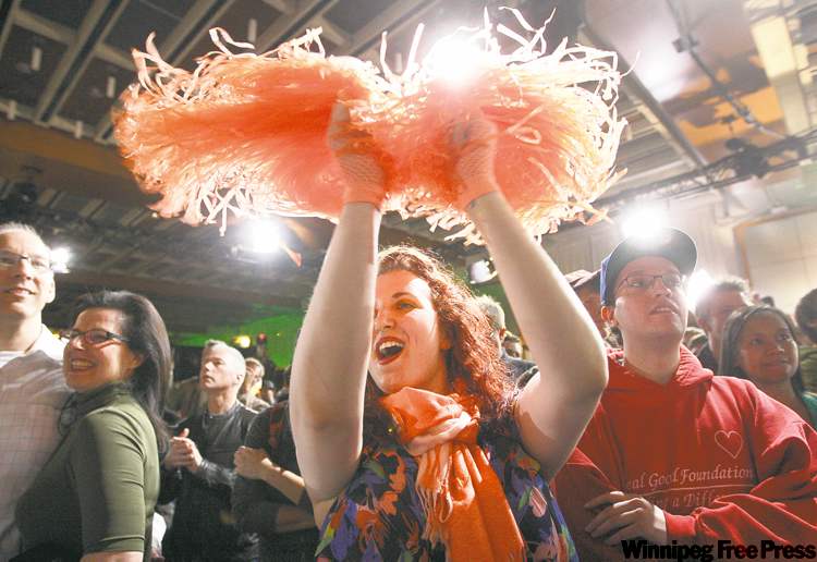 tyler anderson / national post
NDP supporter Tahra Dactyl cheers as party results start to come in at Jack Layton's election event at the Metro Toronto Convention Centre in Toronto.