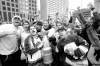 MIKE.DEAL@FREEPRESS.MB.CA 
Hockey fans celebrate at Portage and Main Tuesday after hearing announcement of the return of the NHL to Winnipeg.
