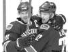 Jonathan Hayward
Vancouver Canucks' Daniel Sedin, right, and twin brother, Henrik Sedin