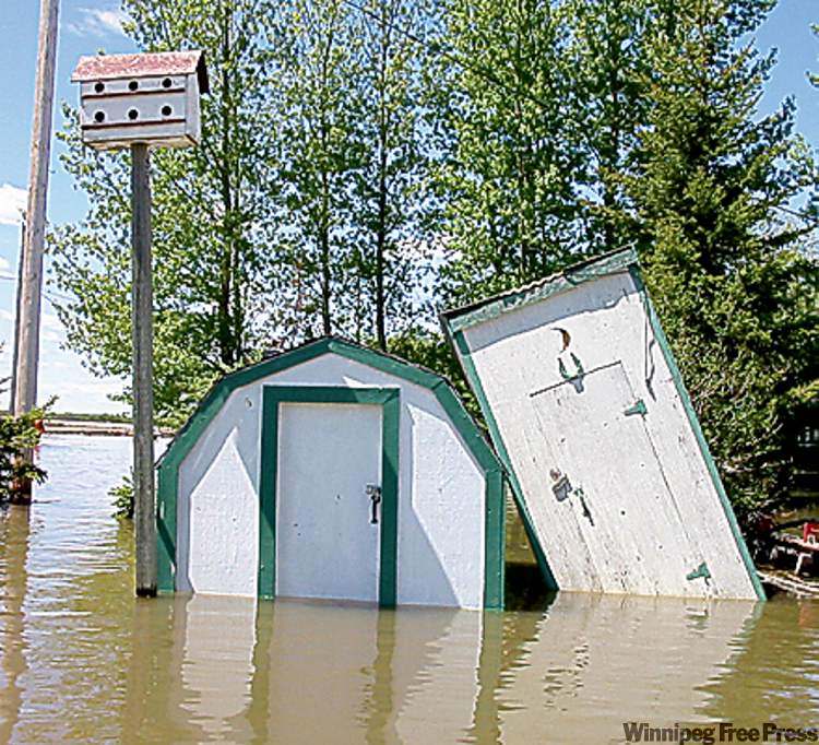 One cottage’s outhouse is knocked over.