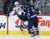 john woods / WINNIPEG FREE PRESS files
Andrew Ladd's rugged two-way play is appreciated by GMs.