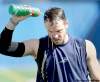 JOE.BRYKSA@FREEPRESS.MB.CA
No. 1  quarterback Buck Pierce, who has reported to training camp in the best shape of his life, cools off during a break in Thursday's morning session.