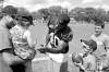Bruce Bumstead/Brandon Sun
Tim Smith / Brandon SunBombers DE Odell Willis is ready to give Jordyn Schultz and her dad Jamie an autograph Saturday as Sam Steeves and Jacob Thomson watch. A hip pointer kept Willis off the practice field.