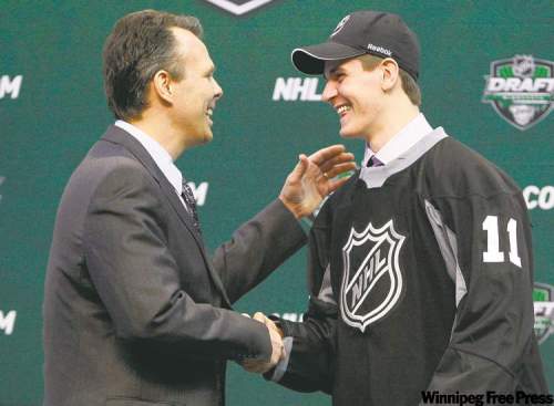 terry wilson photo
More than a few jaws dropped with the selection of Mark Scheifele by the Winnipeg Jets Friday in St. Paul. The draft capped a meteoric rise for the Barrie Colt.`