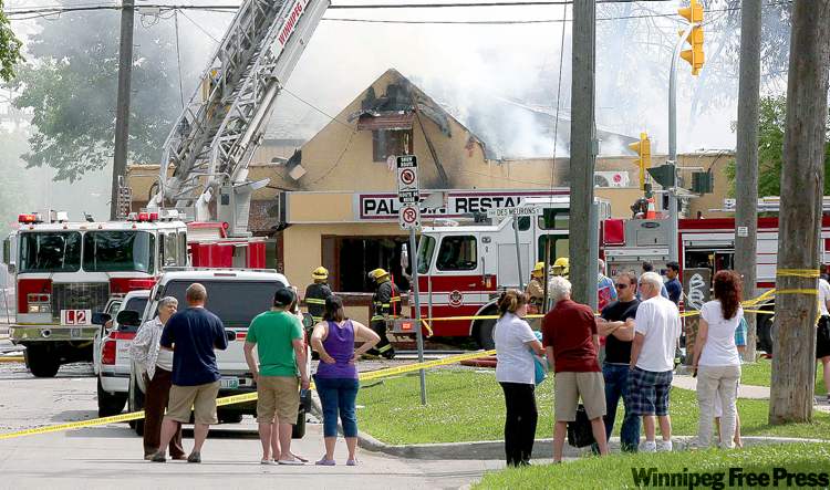 JOE.BRYKSA@FREEPRESS.MB.CA
The Paladin restaurant on Des Meurons Street burned until 7 p.m. Sunday despite firefighters being on the scene shortly after the blaze broke out at 6 a.m.