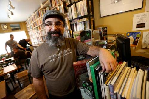 TREVOR HAGAN / WINNIPEG FREE PRESS Bill Fugler owns the Neighbourhood Book Store & Café.