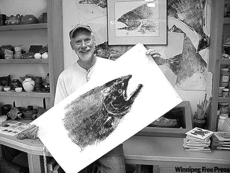 Postmedia
Michael McCarthy / postmedia news
Brian Eccles in his studio in Queen Charlotte City works with �foundmaterials� like salmon he catches.