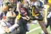 Darren Calabrese / The Canadian Press
Winnipeg's Dorian Smith puts the wraps on Hamilton Tiger-Cats running back Avon Cobourne on Friday.