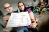 John Woods / Winnipeg Free Press 
Will and Natalie Sauer show the rent-increase notice they received from their landlord.
