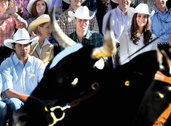 NATHAN DENETTE / THE CANADIAN PRESS
The Duke and Duchess of Cambridge watch the annual Calgary Stampede parade in Calgary during the last leg of their Canadian tour.