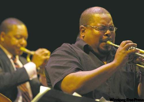 Kaz Zysk / Jazz winnipeg
Derrick Gardner with the Jazz at Lincoln Center Orchestra and Wynton Marsalis (background) at this year's jazz festival.