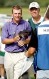 boris minkevich / winnipeg free press
Tom Hoge, with dad and caddy Chuck Hoge, becomes the first Monday walk-on to go on to win a Canadian Tour event. He earned $32,000 for the victory.