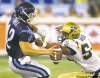 CP
Frank Gunn / the canadian press
Toronto Argonauts quarterback Dalton Bell comes under pressure from the Blue Bombers� Kenny Mainor during first-half action in Toronto Saturday afternoon.