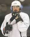 CP
Anaheim Ducks right wing Teemu Selanne, of Finland, watches during practice for Monday night�s Stanley Cup playoff hockey game against the Ottawa Senators in Anaheim, Calif., Friday, May 25, 2007.  The Ottawa Senators and Anaheim Ducks are practically strangers, having faced each other only once since 2003. They get to reacquaint themselves Monday night, slamming into one another in Game 1 of the Stanley Cup finals. (AP Photo/Chris Carlson) close cut closecut