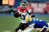Photos by Ruth Bonneville / Winnipeg Free Press
Calgary's Romby Bryant accidently pushes the helmet off of Winnipeg Blue Bomber Jovon John during game July 14 at Canad Inns Stadium.