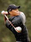 CP
Marvin Fong / The Associated PressTiger Woods tees off during practice for the WGC-Bridgestone Invitational at Firestone Country Club in Akron, Ohio, Tuesday.