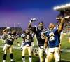 Ruth Bonneville/ Winnipeg Free Press archives
Winnipeg Blue Bombers defenders Brandon Stewart (8) and Jovon Johnson (2) and teammates respond to the screaming Bomber fans and the end of their game against the Edmonton Eskimos Friday night.