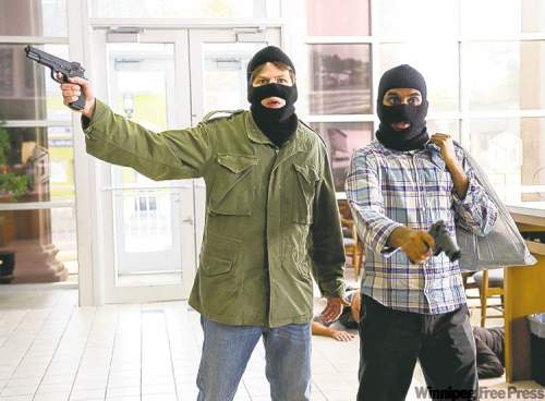 Columbia Pictures
Start laughing and nobody gets hurt: Eisenberg (left, with Ansari) is badly miscast.