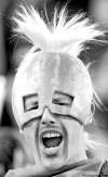CP
A Saskatchewan Roughriders fan wears a watermelon helmet before the start of the 97th Grey Cup game in Calgary, Sunday November 29, 2009. The Roughriders are facing the Montreal Alouettes. THE CANADIAN PRESS/Ryan Remiorz close cut closecut
