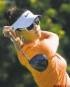 CP
GRAHAM HUGHES / THE CANADIAN PRESSDefending champion Michelle Wie tees off on the first hole in the third round of the Canadian Women�s Open Saturday at Mirabel, Que.