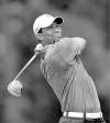 Tribune Media MCT
Tiger Woods at the PGA Championship (above and below), where he missed the cut by six strokes.