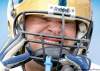 JOE BRYKSA / WINNIPEG FREE PRESS 
Blue Bombers offensive lineman Brendon LaBatte squeezes off his tight helmet at practice Tuesday morning at Canad Inns Stadium.