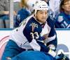 Nathan Denette / The Associated Press
Jets forward Dustin Byfuglien