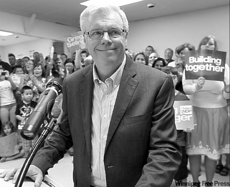 JOE BRYKSA / WINNIPEG FREE PRESS
Premier Greg Selinger directed Wednesday’s message to homeowners, motorists and students.