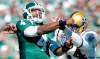 Michael Bell / Regina Leader-Post Archives
Saskatchewan Roughriders quarterback Darian Durant (#4) manages to toss the ball away before getting sacked by Winnipeg Blue Bombers' Kenny Mainor (#54) at the Labour Day Classic held at Mosaic Stadium in Regina last weekend.