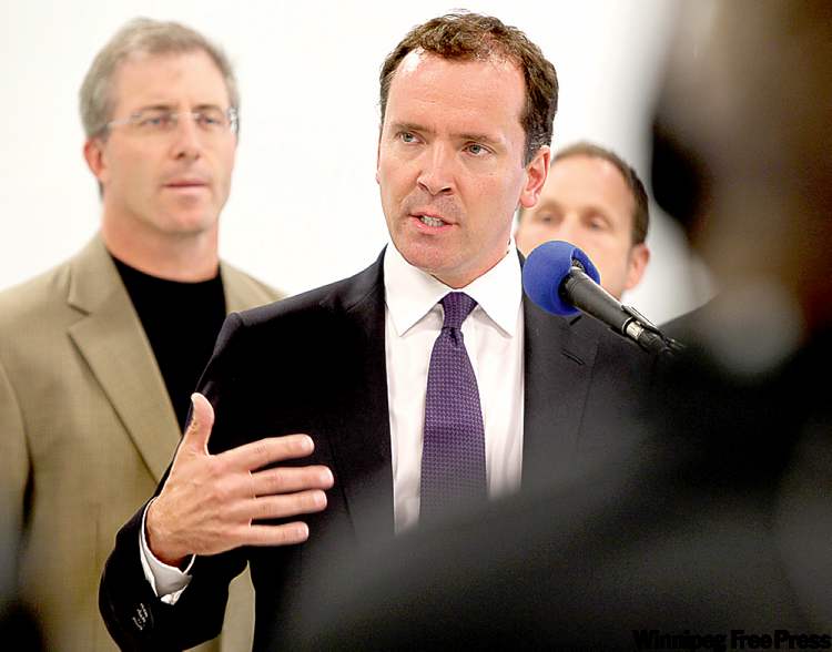 RUTH BONEVILLE / WINNIPEG FREE PRESS
PC Leader Hugh McFadyen announces election promises in health care spending to the media at Gord Steeves campaign office.