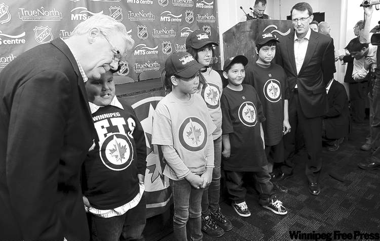 KEN GIGLIOTTI / WINNIPEG FREE PRESS
Premier Greg Selinger (left) and the Jets' Mark Chipman attend announcement at the MTS Centre.