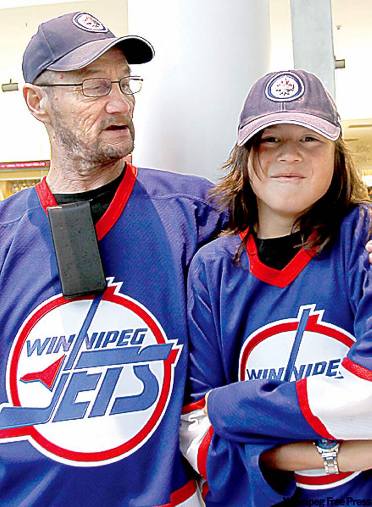 Rennie Thomas with his grandson, Christopher Fontaine.