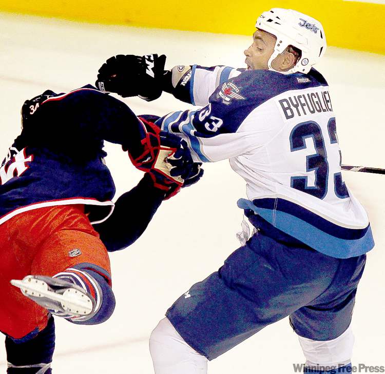 PHIL HOSSACK / WINNIPEG FREE PRESS
Jet Dustin Byfuglien, right, had ‘slurred’ speech when he was arrested Aug. 31, police report says.
