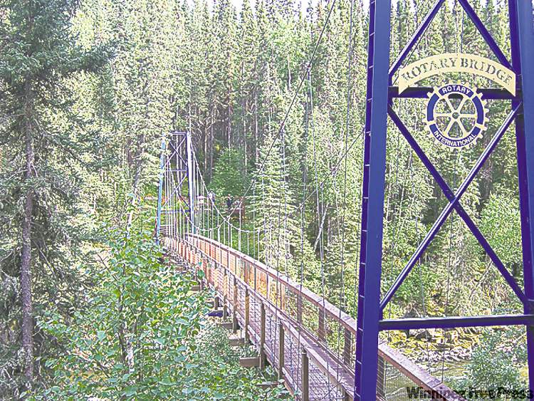 Suspension Bridge over Grass River below Pisew Falls.