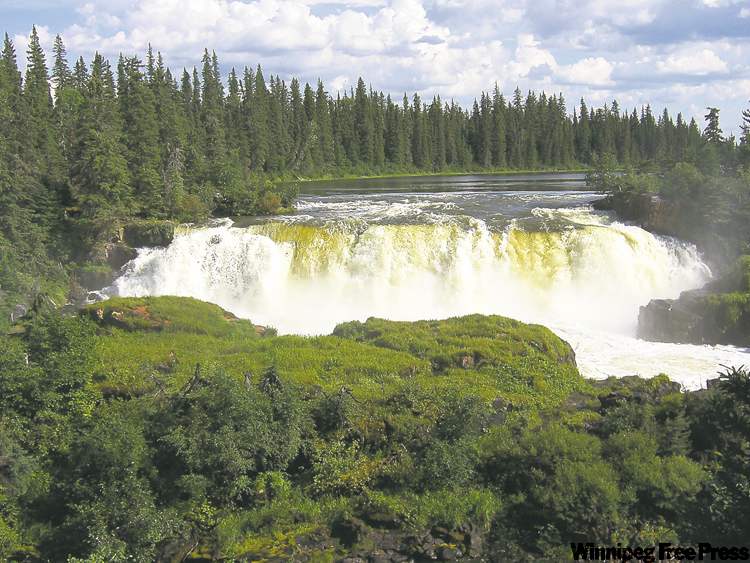 MARTIN ZEILIG/WINNIPEG FREE PRESS
The 13-metre Pisew Falls, on the Grass River south of Thompson, has created its own temperate, misty microclimate.