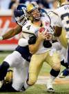 FRANK GUNN / the canadian press
Winnipeg Blue Bombers quarterback Buck Pierce is brought down for an Argonauts sack.