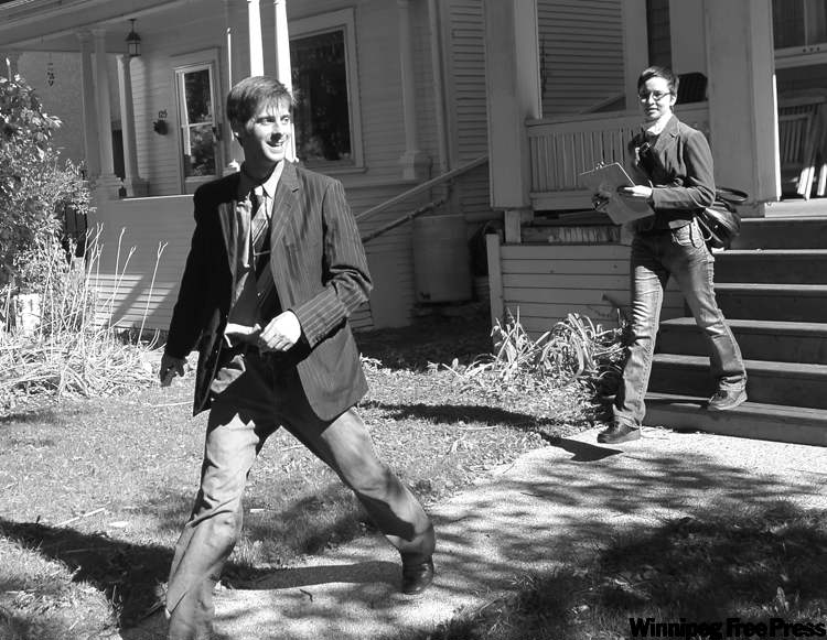 WAYNE GLOWACKI / WINNIPEG FREE PRESS
Green Party Leader James Beddome, who�s running in Wolseley, campaigns Monday in the riding with Anlina Sheng, the Green candidate in Assiniboia.