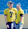 KEN GIGLIOTTI  / WINNIPEG FREE PRESS
Buck Pierce (right), who didn't practise Tuesday, discusses matters with Alex Brink, who took most of the reps with the Bombers' first-team offence.